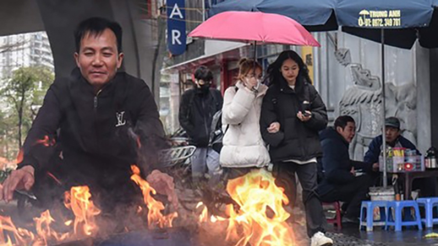 Hanoians bundle up amid sudden cold spell in March